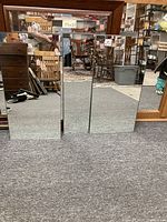 Three mirrors shown: one tall with natural wood arts and crafts style frame with glass grid and two smaller rectangular mirrors with composite wood mixed/distressed frames.