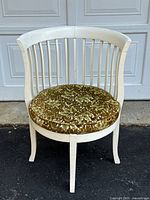 Front view of antique round white painted wood chair with upholstered cushion in textured gold and olive green fabric.
