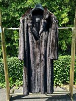 Full length front view of the dark brown mink fur coat