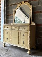 Full view of vintage dresser with mirror showing overall design and condition.