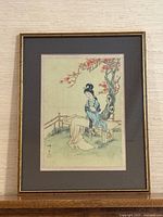 Framed silk painting showing full artwork with matting and frame