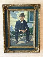 Frontal view of oil on panel painting in ornate gilt frame