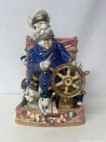Front view of Fitz and Floyd large captain sailor bust planter/vase with colorful hand-painted details and ship wheel