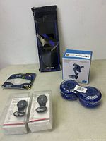 Full view of the lot showing mirrors, car mount, wheels, Spokelit accessories, and insoles