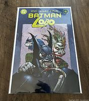 Front cover of the Batman/Lobo graphic novel showing detailed artwork of Batman and a Joker-like character.