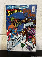 Front cover of DC Comics Presents #67 comic book featuring Superman and Santa Claus with sleigh and reindeer in winter setting.