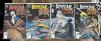 Four Detective Comics issues #604 through #607 laid out side by side showing front covers featuring various Batman themed artwork.