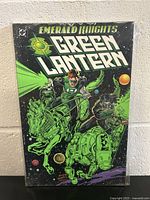 Front cover of Emerald Knights Green Lantern graphic novel, showing detailed comic style artwork in green and black tones