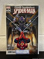 Front cover of Marvel comic Friendly Neighborhood Spider-Man #10 variant cover showing Spider-Man and Doctor Octopus in an action scene.
