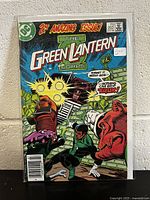Comic book front cover shows Green Lantern in action fighting a large robotic or armored foe, issue #202, with 2nd amazing issue text.
