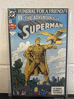 Front cover of The Adventures of Superman issue #499 comic book titled Funeral For A Friend with a $3 price sticker.