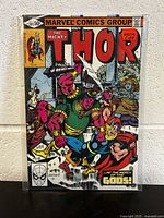 Front cover photo of The Mighty Thor comic book issue #301 by Marvel Comics Group, featuring Thor battling armored enemies with price $1.00.