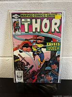 Front cover of The Mighty Thor comic book issue 311 featuring colorful artwork and title.