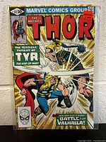 Front cover image of The Mighty Thor #312 comic book showing Thor battling Tyr with bold colored prints and clear text details