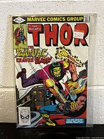 Cover photo of The Mighty Thor #319 comic book showing Thor fighting a green-skinned creature, with Marvel Comics Group branding and price sticker.