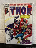 Front cover of The Mighty Thor #330 comic book featuring Thor and the Crusader character in action.