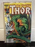 Front cover image of The Mighty Thor #341 comic book showing Thor fighting a large green monster, with Marvel branding and comic issue details visible.