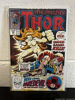 Front cover of The Mighty Thor #392 comic book showing Thor fighting Quicksand. Bottom right corner shows Daredevil's face.