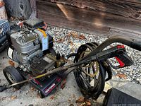 Full view of Craftsman pressure washer with hose and wand