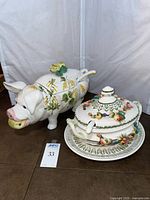 Pig tureen and Capodimonte tureen side by side