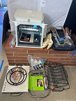Overall lot showing rotisserie oven and accessories