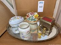 Full lot on mirrored tray showing all items