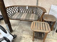 Bench and two tables grouped; shows overall style, materials, cushion