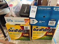 Duraflame cases and pest control box visible