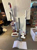 Full view of Shark Rotator vacuum with accessories arranged