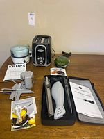 Group shot of all five kitchen appliances displayed on table