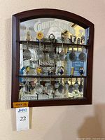 Frontal view of rack filled with advertising spoons