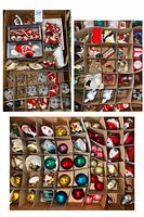 overview of all three layers showing divided compartments filled with assorted ornaments