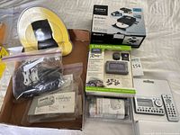 Lot overview showing Roady2 kit box, Sony VRD-MC6 box, remote, cables and accessories