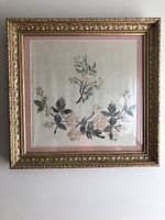 Full view of framed embroidery