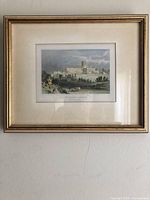 Full view of framed engraving on wall