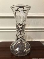 Full front view of vase showing overall form and silver overlay decoration