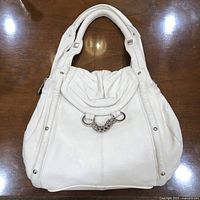 Front view of white Luba J leather handbag