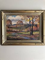 Frontal view of framed painting showing full artwork and frame