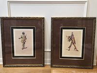 Both framed Maurice Sand prints side by side