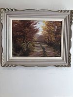 Framed painting on wall