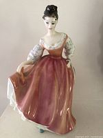 Front view of Royal Doulton Fair Lady figurine