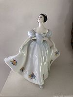 Front view of Royal Doulton "Kate" figurine