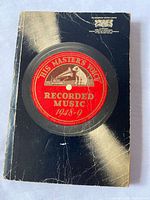 Front cover showing HMV record-label design and surface wear