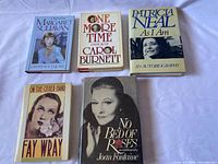 Group shot of all five hardcover biographies