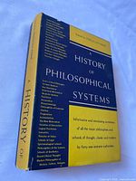 Front of book with dust jacket showing title and editor