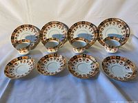 Front view of complete 12-piece set showing pattern