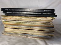 Side view of full stack showing two boxed sets and numerous LP sleeves