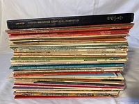 Side view of full stack of approximately 30 LPs