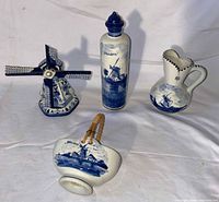 Front view of all four Delft-style pieces