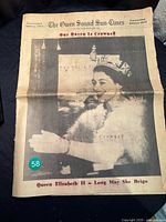 Front page of the 1953 Owen Sound Sun-Times showing a large photo of Queen Elizabeth II in coronation attire with headline in red.